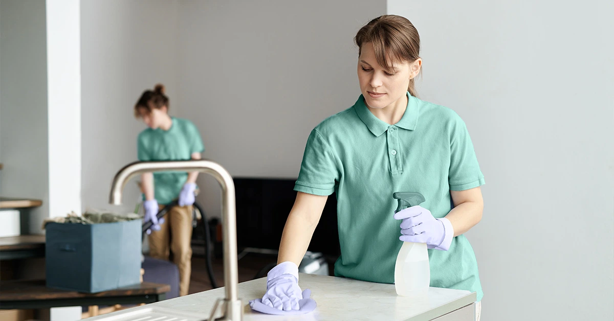 Professional cleaners are deep cleaning an apartment